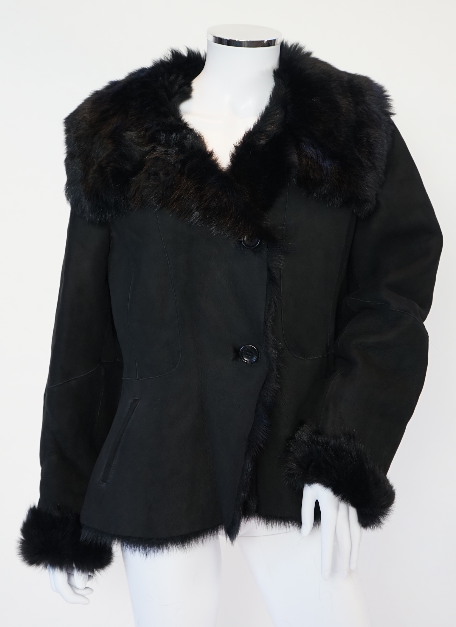 A lady's L K Bennett black shearling jacket, size Large